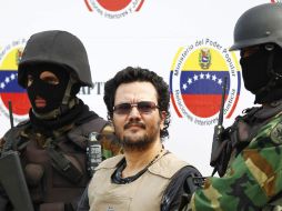 Maximiliano Bonilla Orozco, alias 'El Valenciano', es escoltado por elementos de la guardia nacional venezolana. REUTERS  /