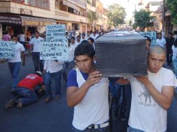 El pasado 13 de diciembre los estudiantes marcharon por las calles de Chilpancingo de manera silenciosa. NTX  /