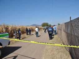 Agentes de la Procuraduría Estatal, acudieron a realizar el levantamiento de los desconocidos.  /