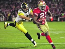 El corredor de los 49ers de San Francisco, Frank Gore (21), anota un touchdown de cinco yardas. AP  /