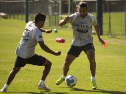Zamogilny (der.) ya entrenó este miércoles en Colomos.  /