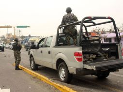 Fuerzas de la Marina de México continúan hoy con la vigilancia de vialidades en Veracruz. EFE  /