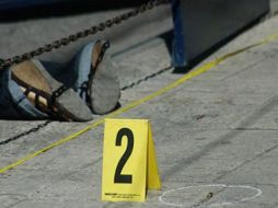 La muerte de la mujer fue por heridas producidas por proyectil disparado por arma de fuego. AP  /