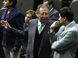 El legislador priísta, Francisco Rojas (izq.) reconoce que la fuerza pública sea suficiente para combatir el narcotráfico. ARCHIVO  /