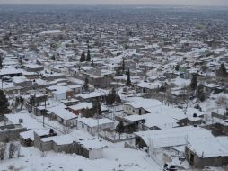 Durante el fin de semana, intensas nevadas cubrieron de blanco algunas localidades de Chihuahua. EFE  /