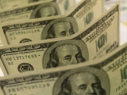 La divisa estadounidense ganó tres centavos en su paridad con la moneda nacional. ARCHIVO  /