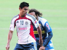Alberto Medina (izq.) sufrió una sobrecarga muscular en el encuentro ante Estudiantes Tecos, por lo que está en tratamiento.  /