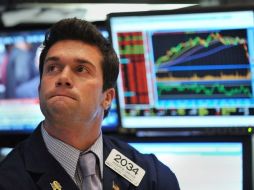El Dow Jones de Industriales, cerró con un mínimo descenso del 0.02 por ciento. ARCHIVO  /