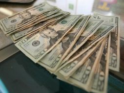 En Nuevo Laredo, el billete verde se ofertó hasta en 14.40 pesos. ARCHIVO  /