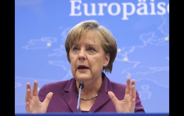 Según el diario estadounidense, Merkel dio un mensaje muy claro sobre la renuncia de Berlusconi en la llamada con Napolitano. ARCHIVO  /