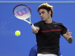 Roger Federer pretende recuperar el puesto número uno de la clasificación de ATP. EFE  /