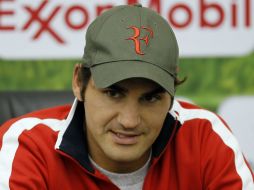 El tenista suizo pretende encontrar un buen nivel al inicio del 2012. AFP  /