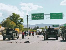 El 12 de diciembre pasado, fuerzas estatales y federales se enfrentaron con los estudiantes de la Normal Rural de Ayotzinapa.  /