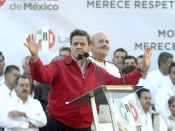 El precandidato del PRI, Enrique Peña Nieto, durante el mitin en Morelia en respaldo al candidato del PRI a la alcaldía. NTX  /