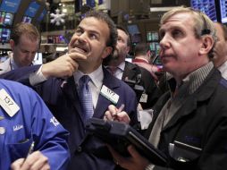 El Standard & Poor's de 500 acciones y el índice compuesto Nasdaq cerraron prácticamente planos.  /