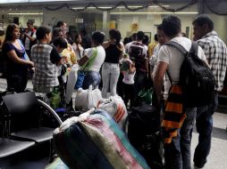 La banda criminal Los Urabeños ordenó a través de panfletos amenazantes un paro armado que afectó hoy al comercio y al transporte.EFE  /