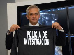 El doctor Miguel Ángel Mancera Espinosa busca la jefatura de gobierno del DF. NOTIMEX  /