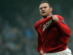 Con doblete de Rooney, el Manchester United eliminó a su acérrimo rival de la Copa inglesa. AFP  /