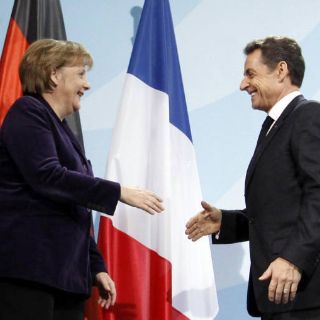 Merkel y Sarkozy progresan en negociaciones para pacto fiscal