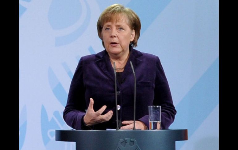 La canciller germana se reunirá hoy con el presidente de Francia, Nicolas Sarkozy. AFP  /