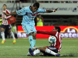 Esta es la acción por la cual fue expulsado Patricio Araujo en el partido ante el Atlante. EFE  /