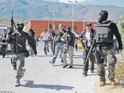 Según el abogado defensor, los peritajes de la PGR confirman que los policías ministeriales no dispararon sus armas. EL UNIVERSAL  /