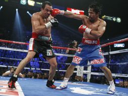 El boxeador Juan Manuel Márquez acudió ante el IFE para responder por qué portó logo del PRI previo a comicios en Michoacán.  /