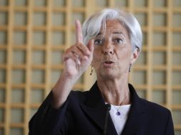 El organismo encabezado por Christine Lagarde, está por dar a conocer el informe con reajustes del crecimiento mundial. AP  /