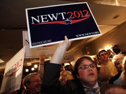 Simpatizantes de Newt Gingrich festejan en la casa de campaña del candidato. AFP  /