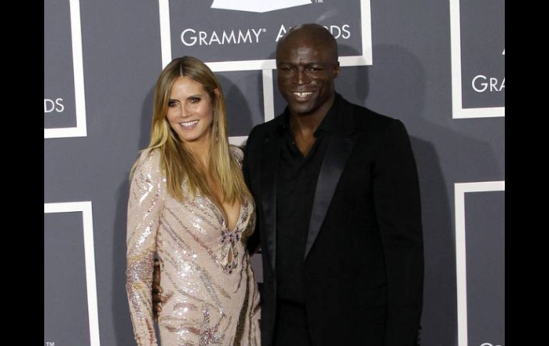 TMZ.COM indico de la supermodelo asistió a los Globos de Oro sin Seal. ARCHIVO  /