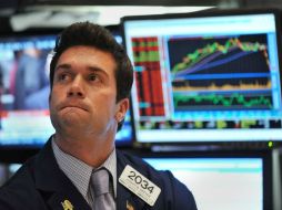 El promedio industrial Dow Jones cerró con un decremento de 33 puntos. AFP  /