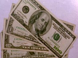 La moneda estadounidense terminó en un mínimo de 12.20 pesos. NOTIMEX  /