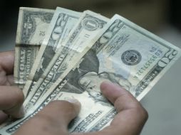 En centros cambiarios regiomontana registraron el mayor nivel a la venta en 13.35 pesos. ARCHIVO  /