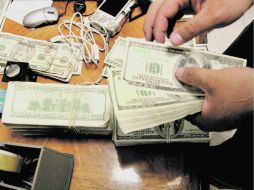 La circulación de dinero ilegal reduce el ingreso fiscal que el Gobierno necesita para financiar motores de desarrollo.  /