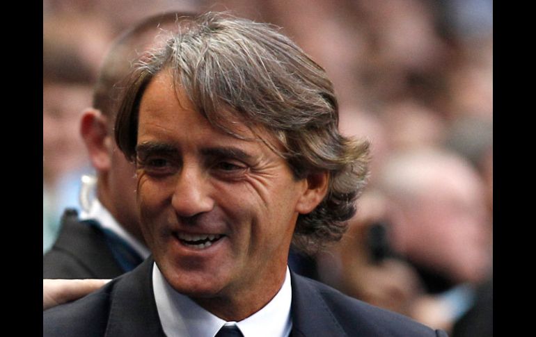 El técnico italiano dijo que Tévez estaba acabado en su equipo después de que desobedeciera sus órdenes. AP  /