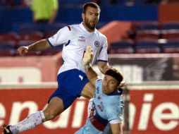 ''Tito'' marcó de forma no válida la anotación que permitió al Cruz Azul rescatar el empate contra el Atlante. AFP  /