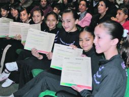 Algunas de las atletas muestran la constancia que premia su participación en la justa panamericana.  /