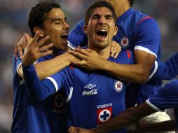 Jair Pereira (centro) fue el autor del primer gol del partido. EFE  /