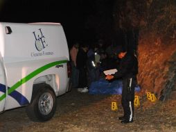 Personal forenses indica que los cuerpos presentaban aproximadamente 18 horas de evolución cadavérica. ARCHIVO  /