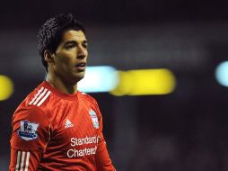 Hace menos de dos meses, la FA usó a Suárez de modelo para demostrar que, supuestamente, no tolerará ninguna actitud racista. AFP  /