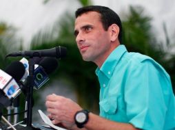Capriles dijo que habrá un caballo que está cansado, en alusión a Chávez. REUTEURS  /