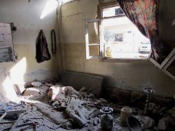 Una casa dañada tras el bombardeo el gobierno de Siria en la ciudad de Homs. AFP  /