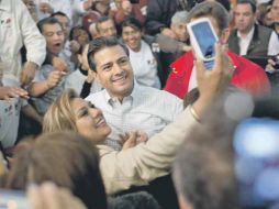 Enrique Peña Nieto estuvo ayer con militantes y simpatizantes en la Ciudad de México. AP  /