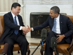 El vicepresidente chino, Xi Jinping, ofreció un diálogo franco en derechos humanos, ante el presidente de EU Barack Obama. AFP  /