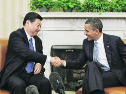 El vicepresidente chino, Xi Jinping (izquierda) se reúne con Barack Obama. REUTERS  /