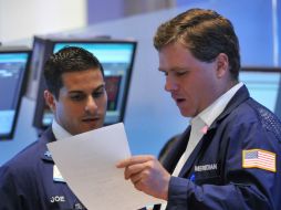 El Dow Jones se situó en 12 mil 780.95 unidades. ARCHIVO  /