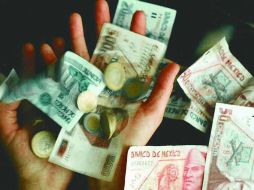 Especialistas dicen que aunque hay pendientes,  el crecimiento de 3.9% del PIB representa un avance. ARCHIVO  /