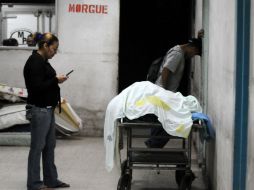 El portavoz del Ministerio Público de Honduras indicó que no se ha estimado todavía el tiempo que llevará la labor forense. AFP  /