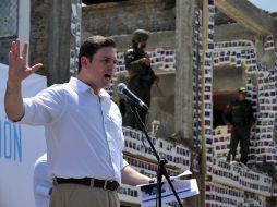 El ministro de Defensa Colombiano, Juan Carlos Pinzón, durante una ceremonia en conmemoración de los caídos en la lucha contra FARC. AP  /