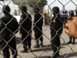 A los funcionarios se les podría dictar arraigo o formal prisión por su responsabilidad en la fuga. AFP  /